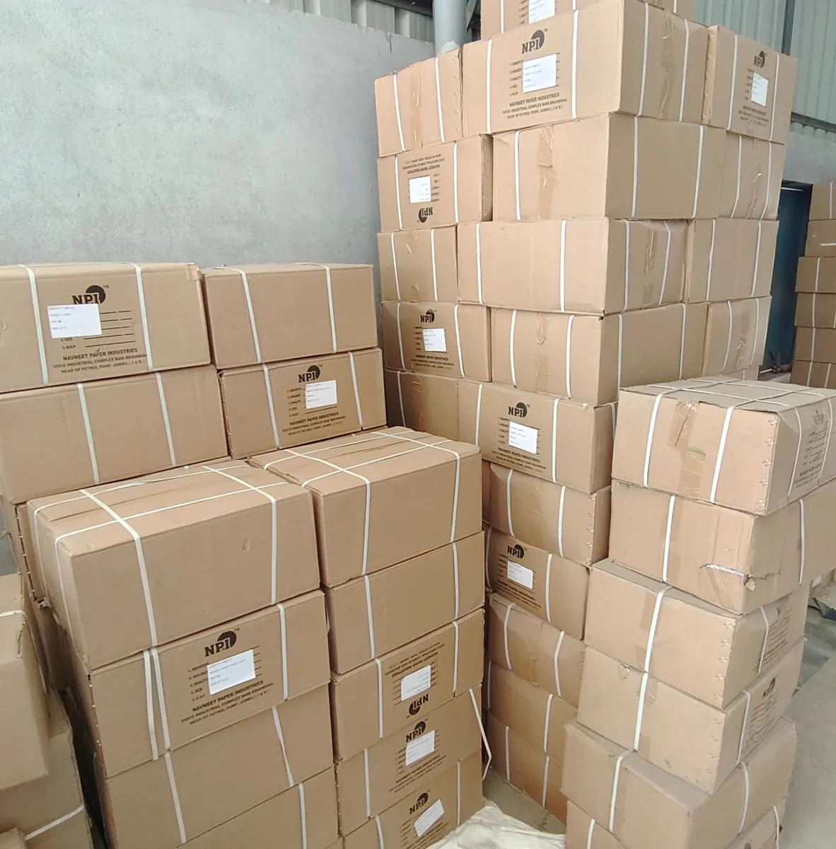 NPI-branded notebook boxes ready for dispatch